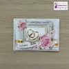 Kartka na rocznicę ślubu „Różowe róże i obrączki” - 10,5 x 15 cm